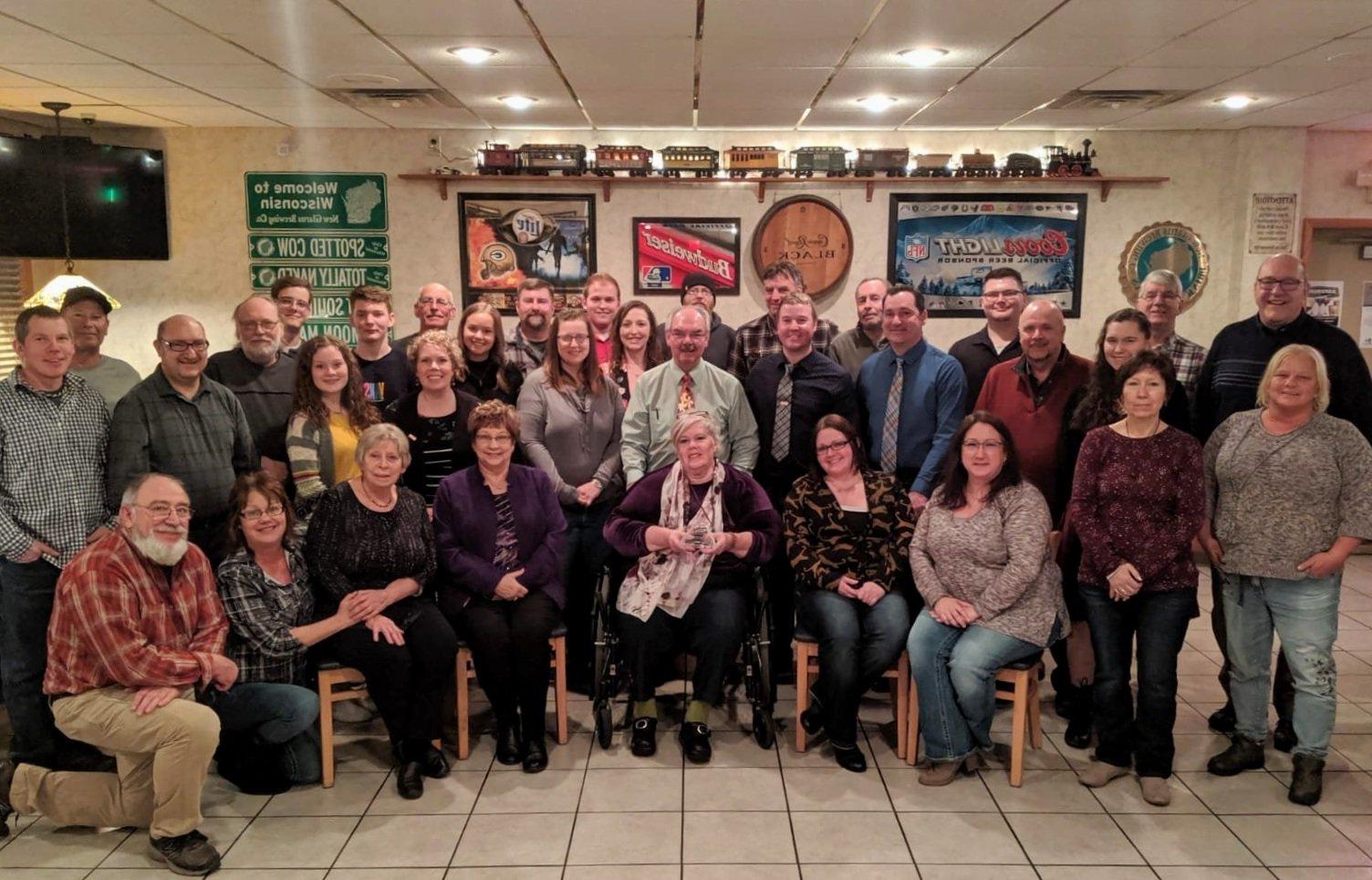 The staff of Scholze Ace Home Center pose for a group picture